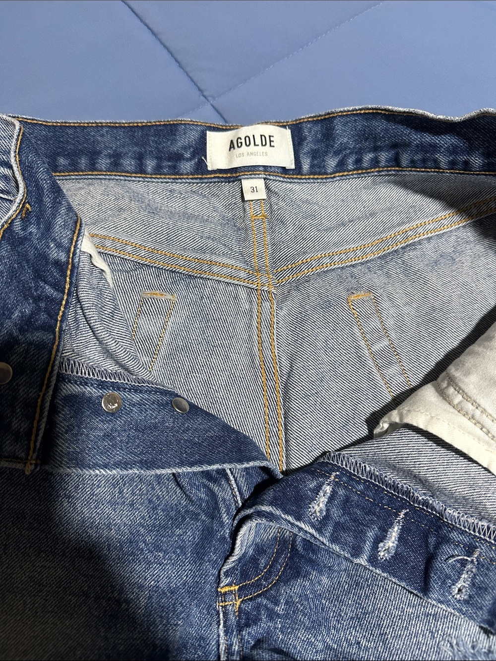 Agolde Distressed Mid-Blue Denim Cutoff Shorts - Picture 2 of 3